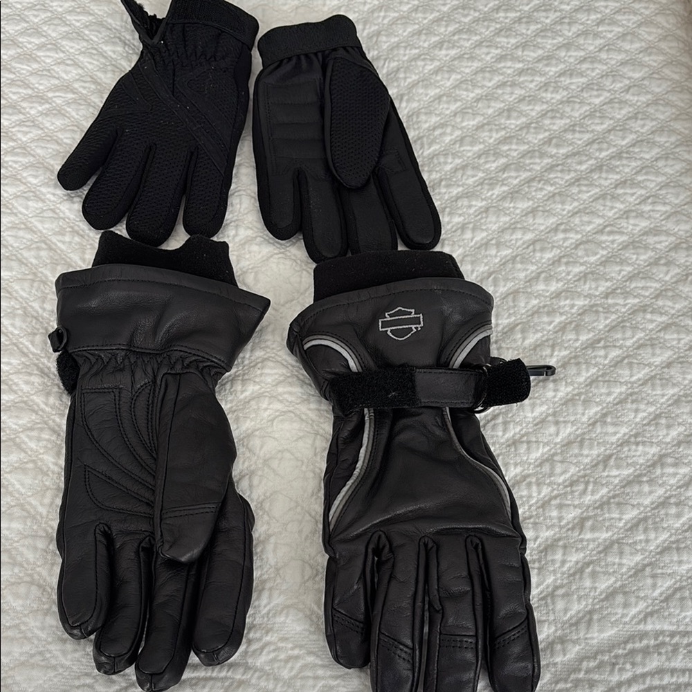 Two pair of genuine Harley Davidson motorcycle riding gloves.